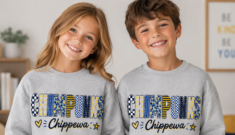 Two children wearing gray sweatshirts with 'Chippewa' text in a room.